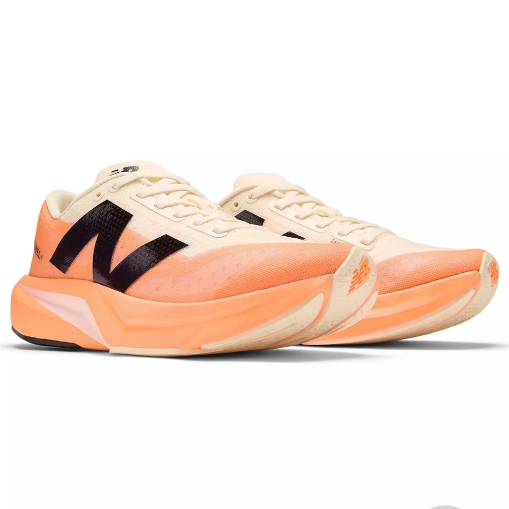 New Balance Women's FuelCell Rebel V4 in Orange and Cream